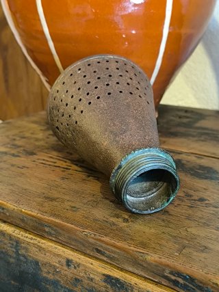 Antiguo espolveador