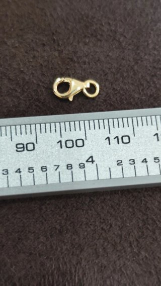 Cierre de oro para cadena nuevo, pequeño.