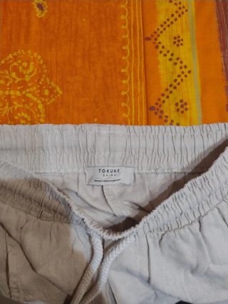 Pantaloncini beige con laccetto