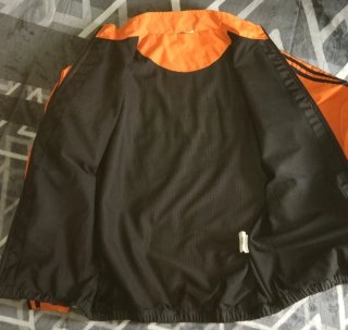 Chaqueta Adidas Adizero Naranja y Negra