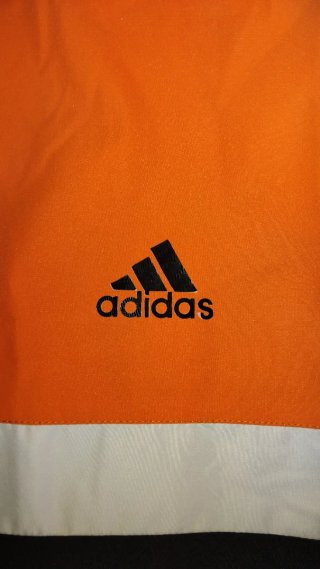 Chaqueta Adidas Adizero Naranja y Negra