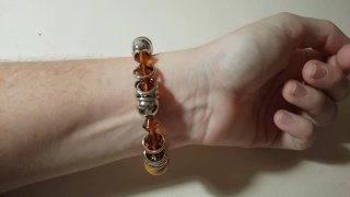Pulsera elástica con abalorios marrones y plateado