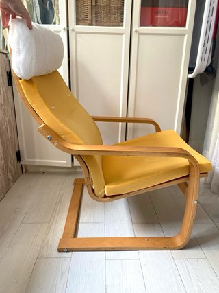 Butaca mecedora Ikea madera y tela. POÄNG