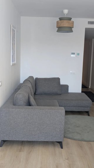 Sofá modular gris de tela
