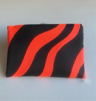 Cartera Clutch Naranja y Negra
