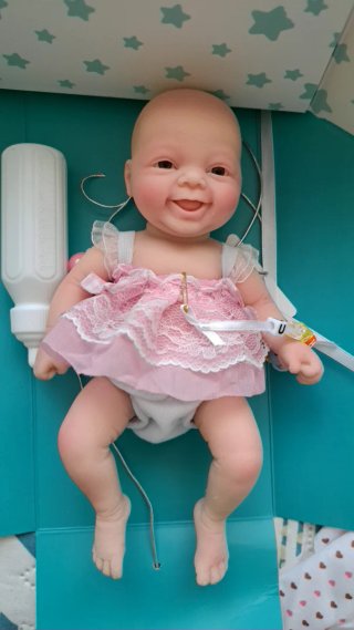 Muñeca Reborn con accesorios de. Silicona Total 20