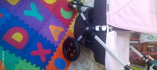 Saco capazo Bugaboo rosa con encaje