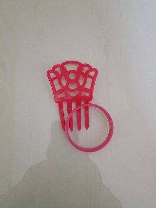 Peinecillo y pulsera rosa
