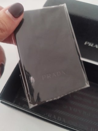 Occhiali da sole Prada neri e oro