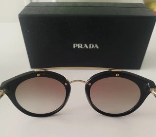 Occhiali da sole Prada neri e oro