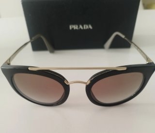 Occhiali da sole Prada neri e oro
