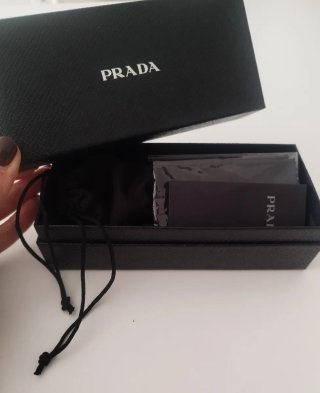 Occhiali da sole Prada neri e oro