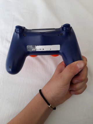 Mando PS4 Naranja Poco Usado