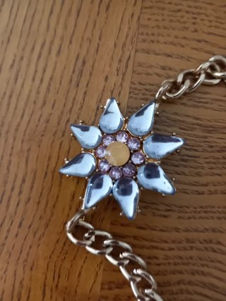 Cinturón cadena metal con flores