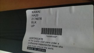 Piano Kawai con banqueta