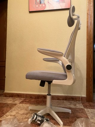 Silla oficina con reposacabezas. Sin estrenar!