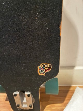 Skate Oxelo con ruedas turquesas