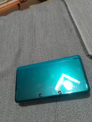 Nintendo 3DS Aqua con funda y cargador