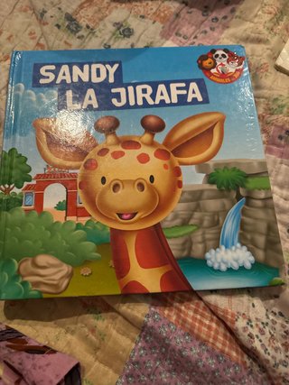 Libro titulado “Sandy la jirafa”
