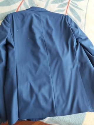 Traje azul de graduación