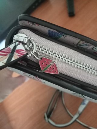 Cartera Parfois grande con estampado de mariposas