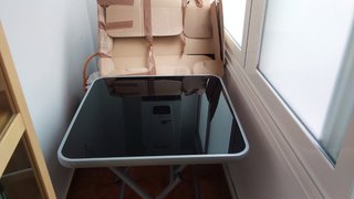 Mesa Plegable Cristal y Metal Regalo una tumbona
