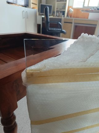 Mesa centro madera con cristal biselado