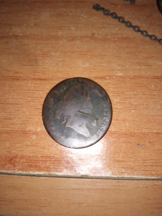 Moneda antigua de cobre