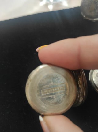 Reloj de bolsillo antiguo plateado