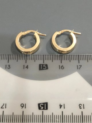 Pendientes de aro unisex de oro nuevos.