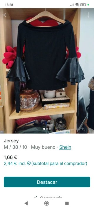 Jersey negro con mangas acampanadas