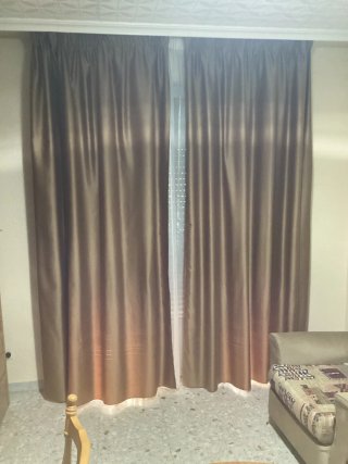 Elegantes cortinas de salón de tela