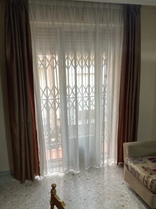 Elegantes cortinas de salón de tela