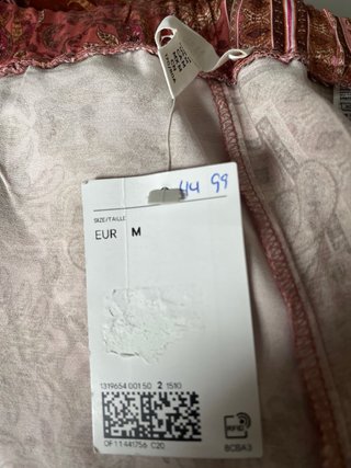 Pantalón estampado rosa y tostado