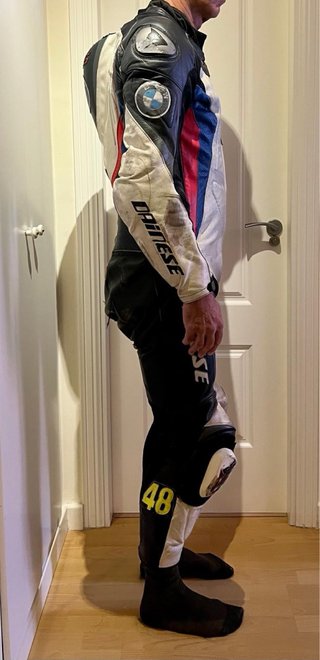 Mono Dainese deportivo negro/blanco