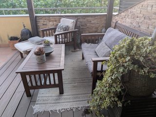 Muebles de madera color teca para terraza