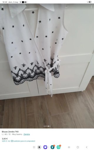 Blusa ZENDRA blanca con estrellas negras