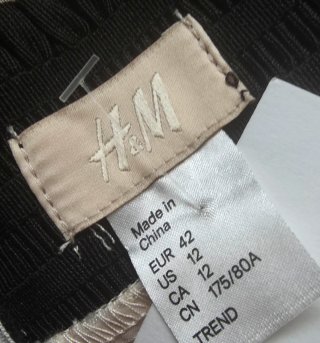 Falda corta H&M beige y negra Talla 42