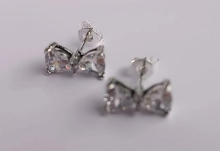 Pendientes lazo brillantes plata