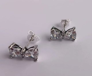 Pendientes lazo brillantes plata