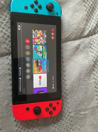 Nintendo Switch con funda, dock y cargador