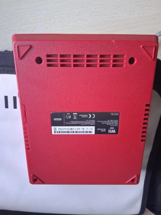 Nintendo Wii mini rossa più cavi e borsa originale