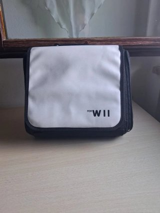 Nintendo Wii mini rossa più cavi e borsa originale
