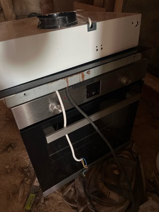 Vitrocerámica 4 fuegos con horno y campana
