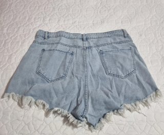 Shorts vaqueros desgastados con dibujos