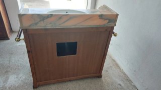 Mueble de lavabo con mármol rosa