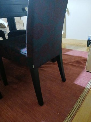 Mesa cuadrada negra con 4 sillas