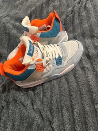 Jordan 4 Retro Azul Hielo Guava