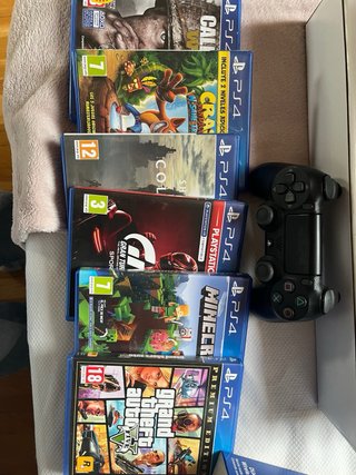PS4 (PlayStation 4) Negra + Accesorios y Juegos