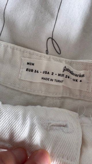 Pantalones cortos blancos vaqueros